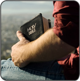 man holding bible